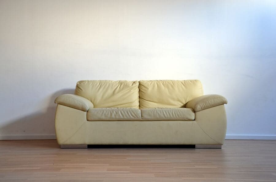 Cream leather two-seat sofa